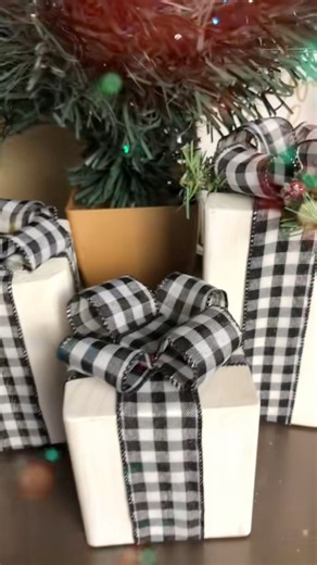 These wood presents are so easy to make and are the cutest Christmas decor! 😍 #diycraftideas #christmascraftideas #christmasdecorinspo #DIYTutorials | Rusty Roost Designs