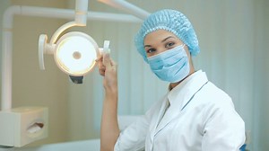 Female dentist wearing mask, portrait - Free Stock Video