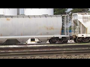 ACF CENTER FLOW covered hoppers, cylindrical hopper at the HARBORLITE perlite processing plant