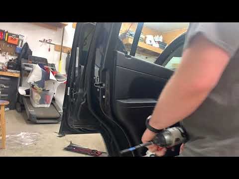 How to remove: 2010 Jeep Liberty rear door panel