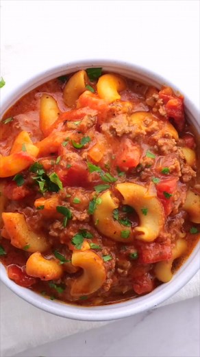 🍲 Dive into the savory goodness of American Goulash (Chop Suey) 🍽️✨ A comforting blend of tender pasta, hearty ground beef, vibrant veggies, and rich tomato sauce. 😋✨ Bring on the flavors of home with this classic dish! 🇺🇸❤️ #AmericanGoulash #ChopSueyDelight #ComfortFoodCravings #TasteOfHome #HeartyAndDelicious ✅Recipe- https://www.jocooks.com/recipes/american-goulash-chop-suey/ | JoCooks