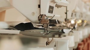 The automatic embroidery machine is working at high speed.