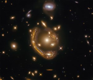 NASA Hubble Space Telescope Captures Amazing Image of a Curved Molten Ring-Like Galaxy