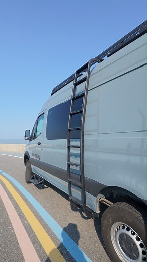 Climb to See the View 🇺🇸 Made for vanlifers who chase horizons. VannCamp Side Ladder — built in the USA, tough, anti-scratch, and ready for every adventure. #vanncamp #vanlifeusa #sprintervan #ladder #vanbuild #AstraGuard #usareels #usamade #usa | VANNCAMP