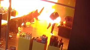 Surveillance video shows an arson attack gone awry when one suspect accidentally lights themselves on fire. | USA TODAY Video