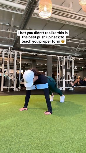 PUSH UP MODIFICATION 🔥 Use a resistance band around your arms to add assistance in proper push up form! This is better than being on your knees because it allows you to be in the same position you will be in an unassisted push up. Give it a try! ✨ . . . #pushup #pushupmodification #pushupform #gymmotivation #gymgirl #gymworkouts #workoutfromhome #gymmusthaves #fitnessmusthaves #tiktokmademebuyit #gymlife #instagramreels #reels #workoutvideos #workoutreels #womensfitness #bellabootybelt #homewor