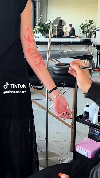 Exploring Backpiece Tattoos: Flower and Koi Fish Designs