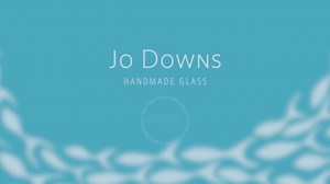 "Glass fusing" is defined as the heat bonding of separate pieces of glass in a kiln. Believed to have begun over 4000 years ago in Egypt and became widespread during the Roman era. There are hundreds of techniques used to create beautiful pieces of glass art. This video gives you a glimpse into the wonderful world of Jo Downs Handmade Glass. | Jo Downs Handmade Glass