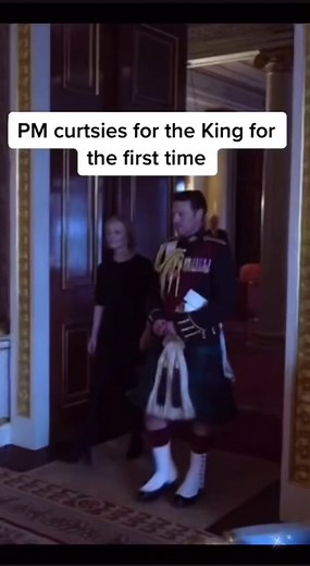 Discussing Liz Truss's First Curtsey to King Charles