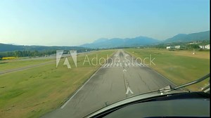Airplane landing at Chambery airport, France. Real time, cockpit POV