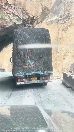 Oversized Load Truck Forces Way Through Natural Stone Arch
