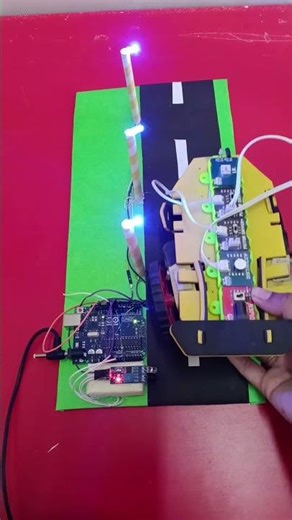Automatic street lights using Arduino Uno ✨ #robot #light #ledlights #robotics #robolights #arduino