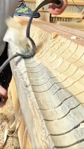 Carving Decorative Grooves on a Large Wood Beam Using an Electric Scraper
