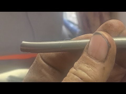 THAT'S A BENT AND BROKEN PUSHROD ON A 454 BIG BLOCK