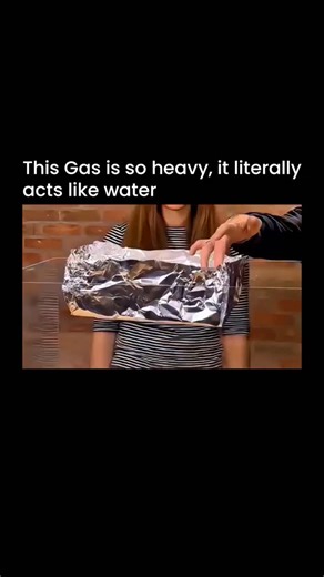 neonexplanation on Instagram: "That heavy gas acting like water is usually Sulfur Hexafluoride (SF₆), a super-dense, non-toxic gas that flows and pours like a liquid because it's much heavier than air (and even water!), displacing it and settling in low spots, making for amazing physics demonstrations. #history #science #fact"