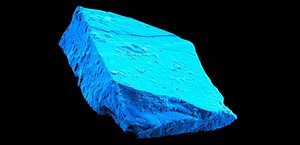 Ice blue meteorite crystals show evidence of an active young Sun