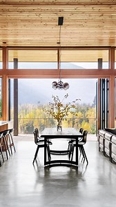 Modern #mountainhome architecture is highlighted at this Methow Valley, WA residence designed by @cast.arch. Weather-performance clad folding #glasswalls by #nanawall provide an immersive indoor/outdoor experience at this horseshoe-shaped dwelling with an envelope of steel, concrete, large #windows, and prominent #wood details. | NanaWall