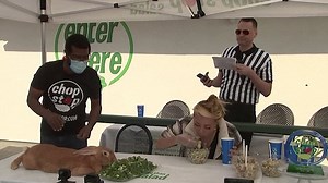 Competitive eater beats giant bunny in salad eating contest