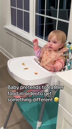 This baby pretends to eat her food when dad turns around 🤣#shortsviral