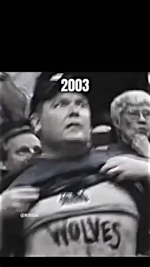 RiRise_Official on Instagram: "Before viral fans were a thing, Minnesota had Jiggly Boy 🏀😂 During the Timberwolves’ 2004 Western Conference Finals run, John Sweeney shocked the arena by ripping off his shirt on the Jumbotron, revealing “KG” painted across his stomach and dancing like crazy. What looked like a wild fan moment was actually a coordinated stunt with the team — even the “security guards” escorting him out were actors. A Star Tribune writer nicknamed him Jiggly Boy, and the clip wen