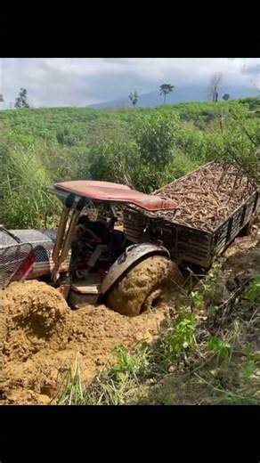 Tractor Climbing a Muddy Slope Gets Stuck #tractor