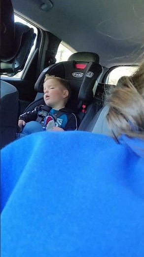 Kid falling asleep in car