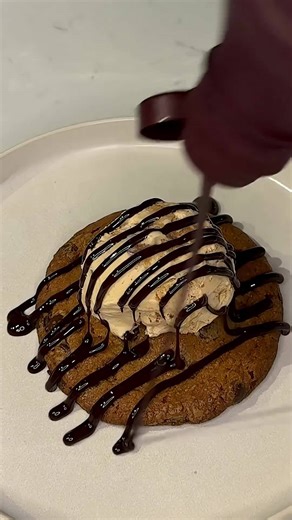 Peanut butter candy core surrounded by chocolate chip cookie dough