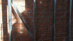 Progressive Construction: Contemporary Home Rising with metal structure for cavity wall insulation in walls and Concrete Structure