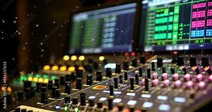 Exploring the intricate controls and settings of a modern audio mixing console in a studio environment Stock Video