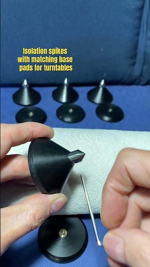 Isolation spikes with matching base pads for turntables