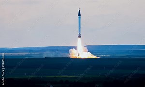 Missile Launch: A powerful missile blasts off from a launch pad, its fiery trail illuminating the sky in a dramatic display of technological prowess. The image evokes a sense of awe and power, capturi Stock Video