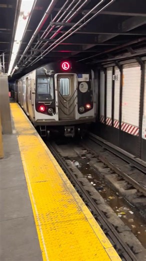 R160A L train leaving 6th Ave and 14 Street station