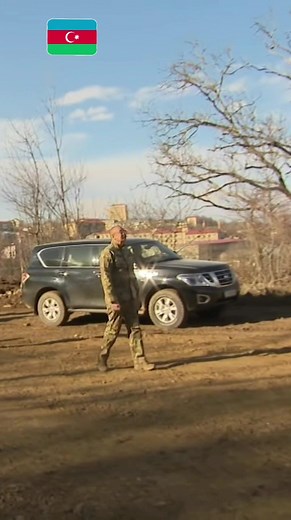 Walking Through the Barren Landscape in Military Uniform