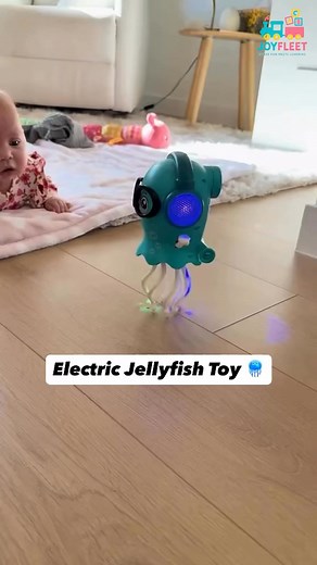 1K views | ✅Interactive Dancing Jellyfish - Colourful lights, cheerful music and 360° bump-&-go wheels make crawling and chasing wildly fun. Ideal for babies (6 mo+) to 12 yrs, this toy builds motor skills, spatial awareness and indoor-play energy. Screen-free, safe and portable for home or outdoors | JoyFleet | Facebook