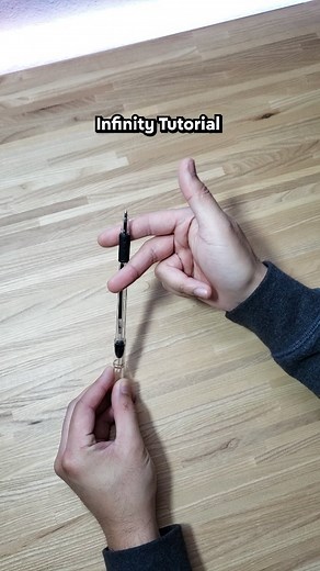 Ryzing Spins on Instagram: "Learn the Infinity pen trick made easy! ♾️ Tip: keep fingers loose and limp and use the momentum of the beginning drop to swing the pen around and back up. 👍 Follow me to learn more pen spinning tricks! ☝️ #penspinning #tutorial #tricks #objectmanipulation #contactjuggling #infinity #slowmo #slowmotion"