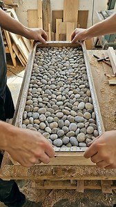 The most beautiful table made from river stones! 😍 Took some river stones, wood, and resin... and created this glowing masterpiece! ✨ The process was so satisfying to watch. Tell us: What do you think of the final look with the lights on? #Woodworking #EpoxyResin #DIYProjects #HomeDesign #Craftsmanship #RiverTable #UniqueFurniture #DecorIdeas #ResinPour | One minute