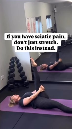 If your hamstrings feel “tight” no matter how much you stretch, it’s not about flexibility. When the pelvis doesn’t feel supported, the hamstrings and surrounding tissues start gripping to protect the body. That gripping can irritate the sciatic nerve and create that sharp, deep ache. So instead of forcing a deeper stretch, we calm the nerve by gently sliding it and then we build support and stability through the pelvis, deep core, and breath. Slow breath = safety. Safety = pain eases. Then we w