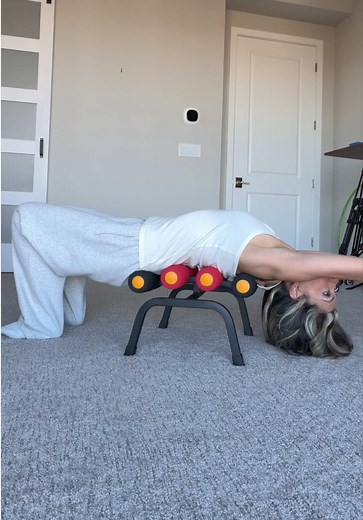 Instant back and neck relief on this mini Inversion Table #backstretch #neckpain #backmassage #decompress