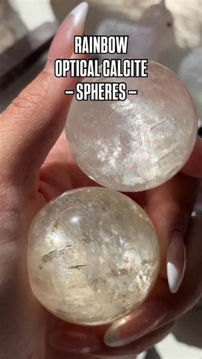 These gorgeous Rainbow Optical Calcite spheres give off sooo much light and sparkle! We’ll have a variety of calcite colors to choose from ❤️ Did you know that the rainbows that you see are actually optical illusions caused by the way light bounces off the internal inclusions and cleavage of the calcite? Grab yourself a piece of the rainbow during our “Shimmer & Sparkle” live on Friday 12/12 @ 3PM CST ⏰ #opticalcalcite #opticalcalcitesphere #calcite #rainbowcalcite #crystals #crystalshop #thesto