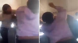 Moment furious Indiana mother boards school bus to brutally beat son's 14-year-old 'bully'