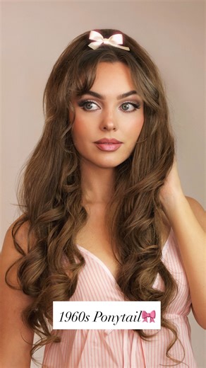 Jackie Wyers on Instagram: "🎀Perky ’60s Ponytail: A Hair Tutorial 🎀 One of my favorite easy ponytails with a vintage vibe 💗 This 1960s-inspired high ponytail is perfect if you have fine, straight hair and struggle to get volume... adding height with slight hair padding & an extension makes such a difference! Finish it with a bow ponytail for that coquette look 🎀 Wearing cozy PJs from @urbanoutfitters Extensions from @irresistibleme_hair #ponytail #highponytail #hairtutorial #60shair #1960sha