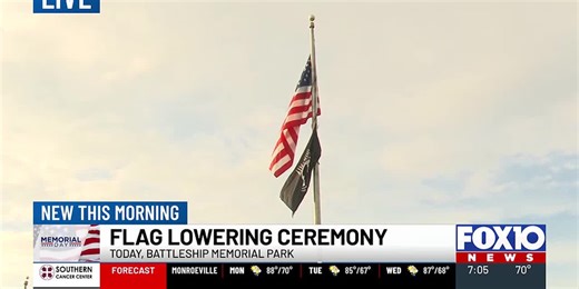 Memorial Day flag lowering ceremony at Battleship Memorial Park