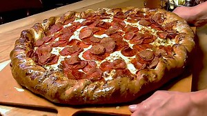 The Biggest Pizzas Ever Eaten On Man V Food