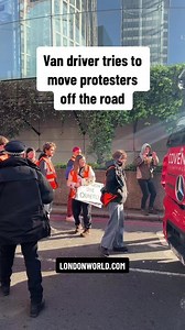 Full story at LONDONWORLD.COM Van driver tries to move Just Stop Oil protesters out of the road at Waterloo, London. #protest #London #JustStopOil #climatecrisis