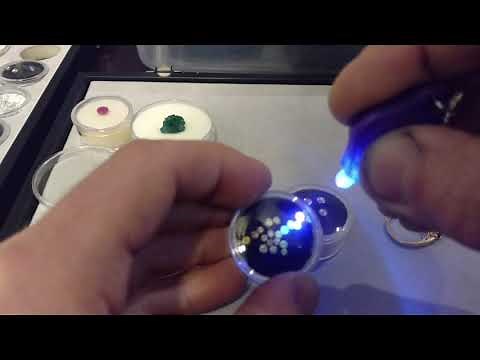 Fluorescent Diamonds and Emeralds