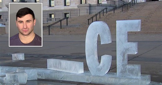 Far-right influencer Jake Lang charged for damaging ‘Prosecute ICE’ sculpture