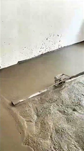 Leveling Concrete Floors Using a Vibrator Screed