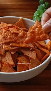 Crispy and Tangy Nachos at Home Recipe 😋 🥰 These homemade nachos are crunchy, full of flavor, and go perfectly with your favorite dips or cheese sauce. 🧂 Ingredients List:✨ For Nacho Dough: Tomato puree – 1 cup Semolina (sooji) – ½ cup Wheat flour – 2 cups Salt – to taste Red chilli powder – ½ tsp Black pepper powder – ½ tsp Oil – 1 tsp (for kneading) For Spice Mix:✨ Kashmiri red chilli powder – 1 tsp Coriander powder – ½ tsp Roasted cumin powder – ½ tsp Black salt – ¼ tsp Amchur (dry mango) 
