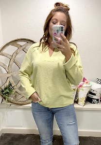 1.4K views · 16 reactions | WE'RE IN STITCHES OVER THIS V-Neckline Long Sleeve with X Stitch Box Detail Knit Rib Top. This super top by the designer by together is pure perfection! Long sleeve, lightweight, v-neckline, shorter length, and oversize fit! Carolyn is wearing a small 67% POLY 29% COTTON 4% SPANDEX Available in S, M, L for only $55.00! To order: Comment Sold, Size, Color (Lemon) Style #15762 | Emma Lous Boutique | Facebook