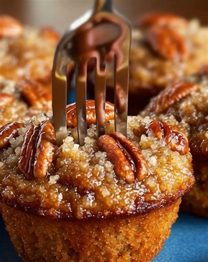 Gooey, nutty, and perfectly sweet 🥧🧁 These Pecan Pie Muffins taste just like pecan pie but in a warm, handheld bite. Simple ingredients, rich flavor—pure Southern comfort! 🤎✨ #PecanPieMuffins #SouthernBaking #EasyRecipes #SweetTreats #ComfortFood Pecan Pie Muffins Recipe Ingredients: 1 cup packed light brown sugar ½ cup all-purpose flour 2 cups chopped pecans ⅔ cup butter, softened 2 large eggs, beaten Directions: Preheat oven to 350°F (175°C). Grease or line a 12-cup muffin tin. In a bowl, m